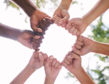 closeup-of-fists-in-a-circle-outside-in-nature-di-2026-01-09-11-09-59-utc